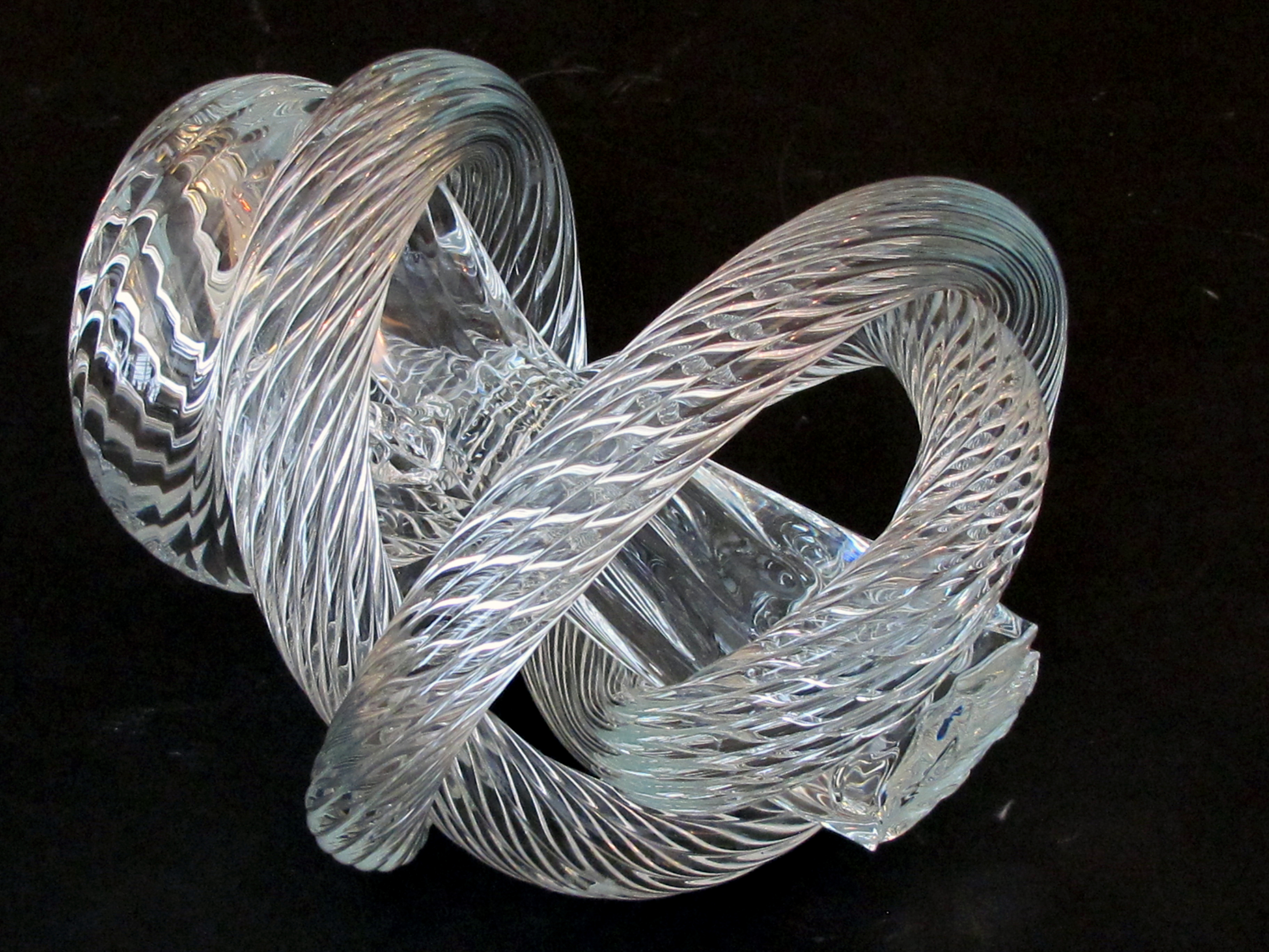 a wellcrafted and heavy glass rope knot by Fusion Z Glassworks; with