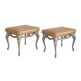 a gracefully-shaped pair of french rococo style gray painted rectangular stools with leather seats
