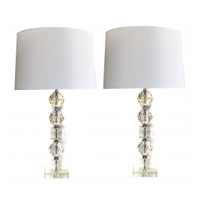 a shimmering and large-scaled pair of french mid-century stacked faceted crystal lamps