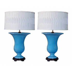 a striking and robust pair of french art deco turquoise crackle-glazed urns now mounted as lamps