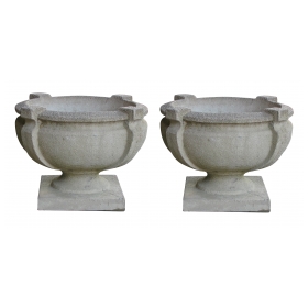 a handsome pair of cast stone garden urns 