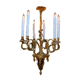 a curvaceous french louis xv style gilt-bronze 6-light chandelier with dramatically scrolling candlearms