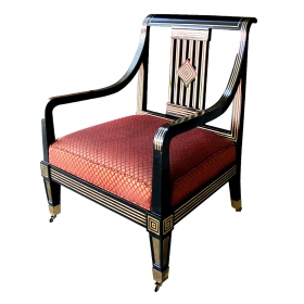 an impressive and boldly scaled russian neoclassical style black lacquer armchair with brass inlay
