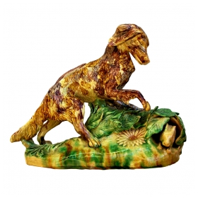 an expressive and rare english yellow ware polychromed figure of a hunting dog and hare