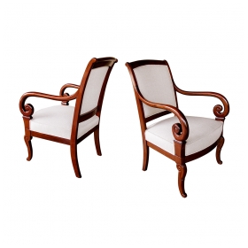 a gracefully proportioned pair of french restauration mahogany armChairss
