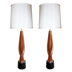 a sleek pair of american 1960's carved mahogany teardrop form lamps