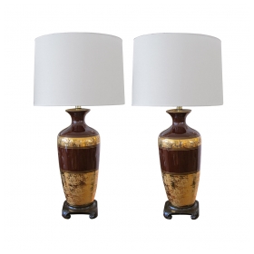 a richly-colored pair of american 1960's chocolate-brown ceramic lamps with fine gilt decoration