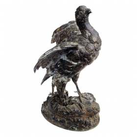 a finely-rendered french spelter figure of a standing pheasant; after a sculpture by Paul Comolera 1818-1897; impressed signature 'P Comolera'