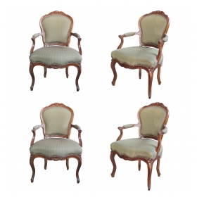 an elegant and well-carved set of 4 french louis xv style walnut open armChairss
