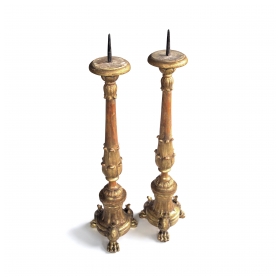 a good quality and large pair of italian baroque style giltwood tripod pricket sticks