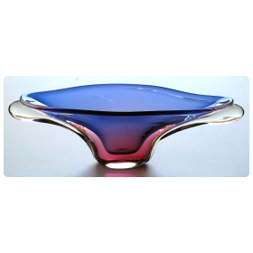 a large and impressive murano mid-century elliptical-form glass bowl in hues of blue and aubergine; by seguso