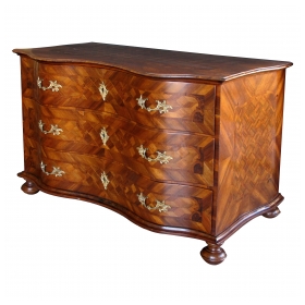 a handsome and good quality german baroque serpentine-form parquetry and walnut-veneered 3-drawer chest