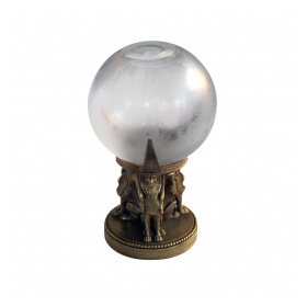 a well-executed swedish crystal orb vase on a bronze egyptian-inspired stand; vase etched "Orrefors" with original foil label