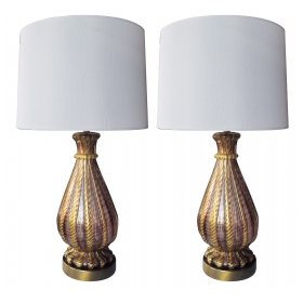 a good quality pair of murano mid-century aubergine and gold aventurine ribbed glass lamps