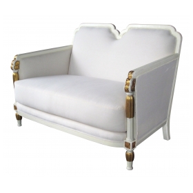  a stylish french art deco ivory painted and parcel-gilt settee