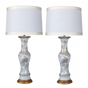elegant pair of 19th century chinese baluster form vases now mounted as lamps with gilt decoration on a white ground