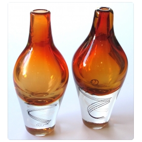  exceptional pair of Kosta Boda Swedish orange art glass vases; designed by Klas-Goran Tinback