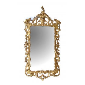 elegant and superbly-carved english george II giltwood mirror with elaborate foliate crest