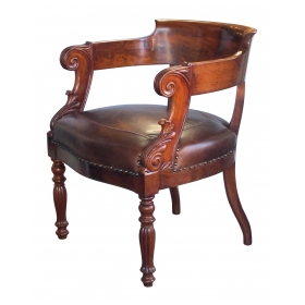 dramatically-carved and handsome french restoration mahogany barrel-back desk chair with bold acanthus leaves