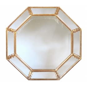 a shimmering french 1960's gilt wood octagonal mirror with foliate elements