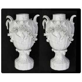 finely rendered pair of french rococo style blanc-de-chine urns/vases 