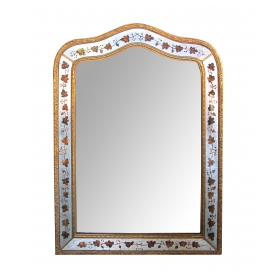 well-executed french 1940's Maison Jansen eglomise  and giltwood wall mirror