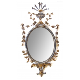 a chic and good quality italian 1960's silver and gold gilt metal oval mirror by with trophy crest and floral and foliate swags; attributed to palladio, italy