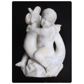 an expressive and well-carved italian rococo revival carrara marble niche fountain of a putti seated on a dolphin