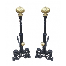 a large and stately pair of spanish tudor-style hand-wrought iron andirons with brass elements