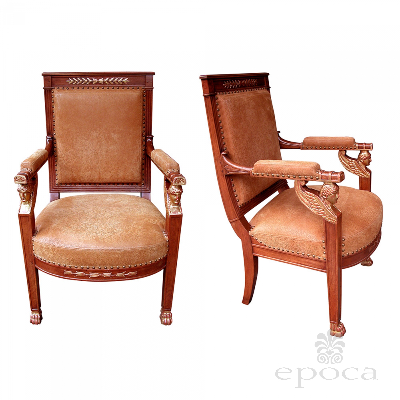 A Pair of Continental Neoclassical Chairs with Carved Egyptian Head on the Arm A Pair of Continental Neoclassical Chairs with Carved Egyptian Head on the Arm