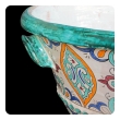 a large and vibrantly glazed pair of Moroccan conical-form double-handled pot