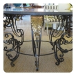 french rococo style wrought-iron circular center table with gray marble top