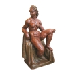 a boldly-rendered french brutalist terra cotta sculpture of a seated nude woman; signed 'Rene Romage, 1942'