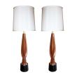 a sleek pair of american 1960's carved mahogany teardrop form lamps