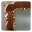 a curvaceous danish rococo style burl walnut and carved giltwood mirror with exuberant rocaille carving