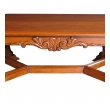 a handsome and boldly-carved french baroque style cherrywood coffee table with canted corners