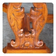 a handsome and boldly-carved french baroque style cherrywood coffee table with canted corners