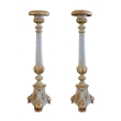 a large-scaled pair of italian neoclassical pale green painted and parcel-gilt carved candlesticks