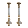 a large-scaled pair of italian neoclassical pale green painted and parcel-gilt carved candlesticks