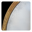 an elegant pair of french napoleon III carved giltwood oval mirrors