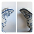 a good pair of french blue and white tin-glazed faience pitchers or ewers; probably Rouen