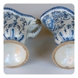 a good pair of french blue and white tin-glazed faience pitchers or ewers; probably Rouen