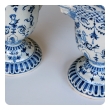 a good pair of french blue and white tin-glazed faience pitchers or ewers; probably Rouen