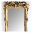 an ornately carved french rococo gilt-wood mirror with exuberant crest