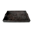a well-carved german black forest rectangular wooden tray