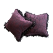 a sumptuous pair of aubergine cut velvet pillows with silk ribbon fringe