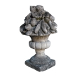 a lush english cast-stone floral and fruit-filled garden urn