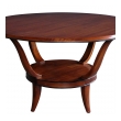 a stylish french mid-century mahogany circular center/cocktail table with ebonized highlights