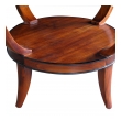 a stylish french mid-century mahogany circular center/cocktail table with ebonized highlights