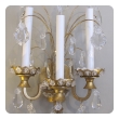an elegant pair of french 1940's gilt-tole and crystal 3-arm wall sconces by maison jansen 